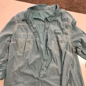 Long sleeve button up light blue top